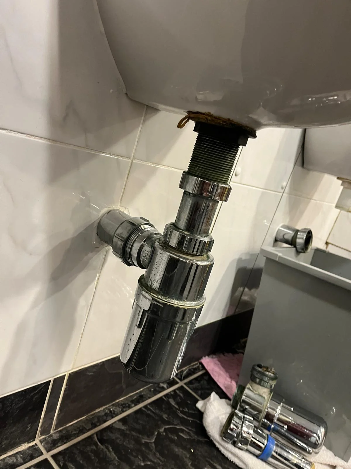 Commercial urinal reinstated after plumbing repair