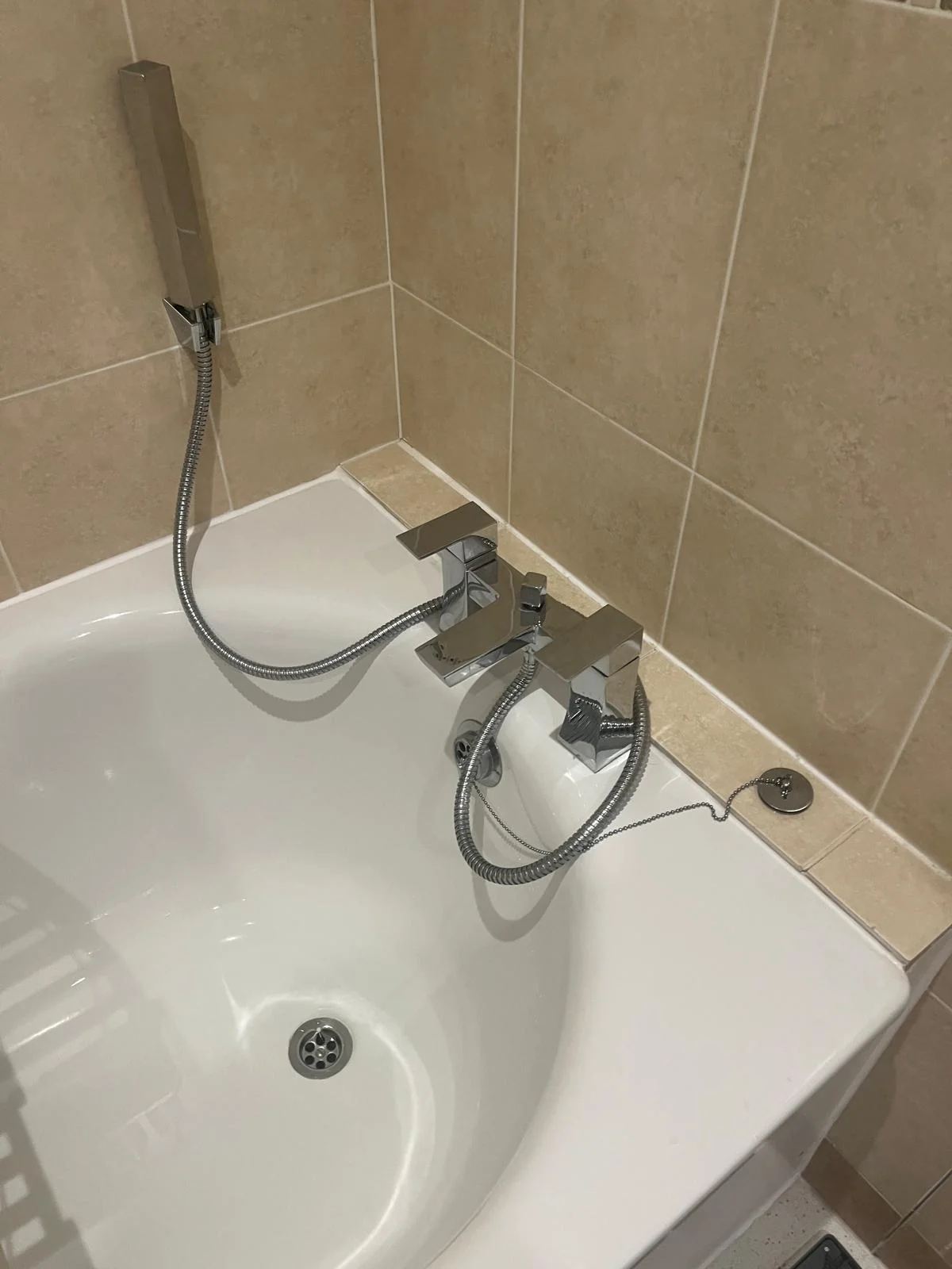 Pipework prepared beneath a commercial washroom basin