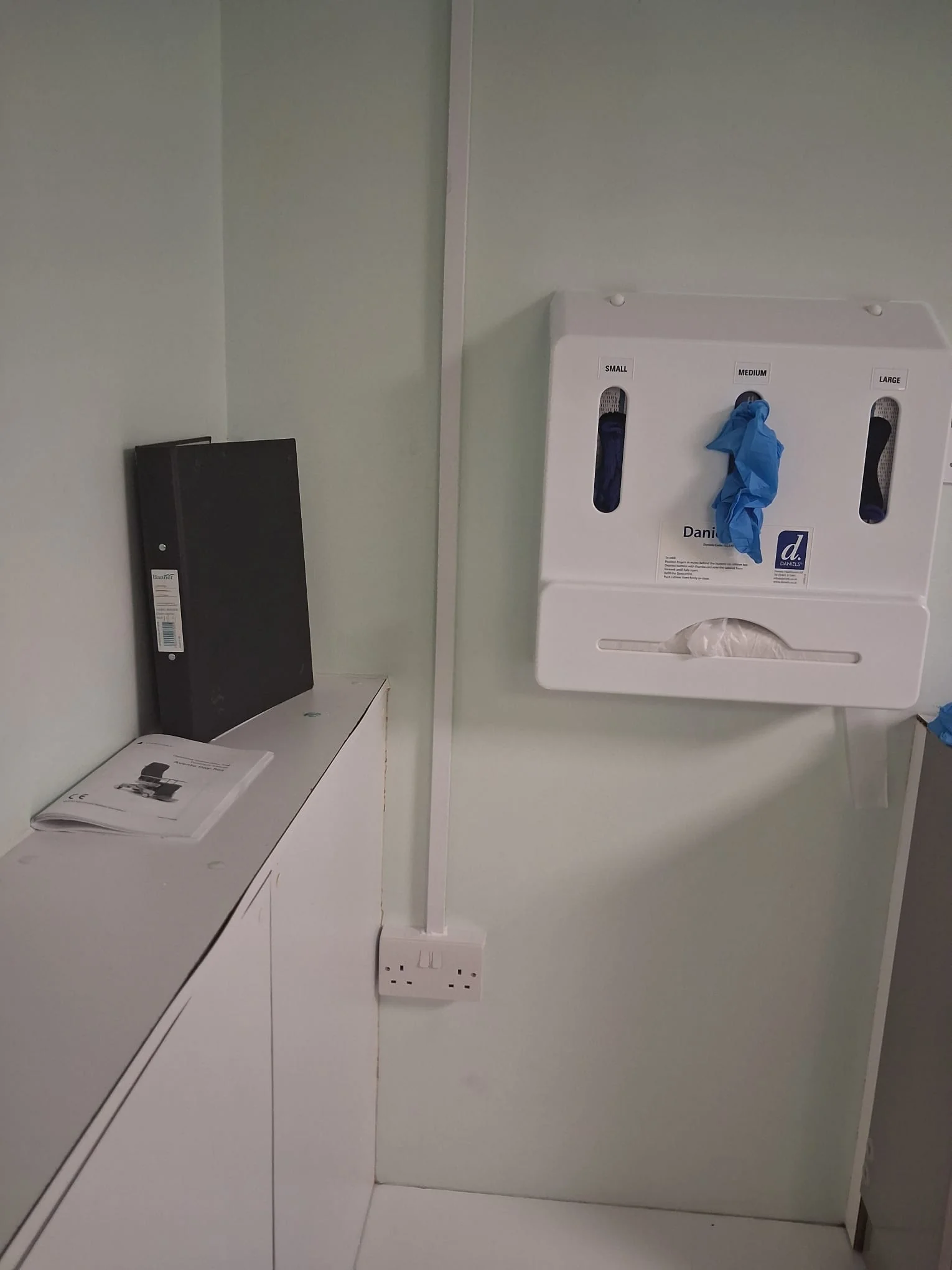 Damaged electrical socket exposed during emergency callout