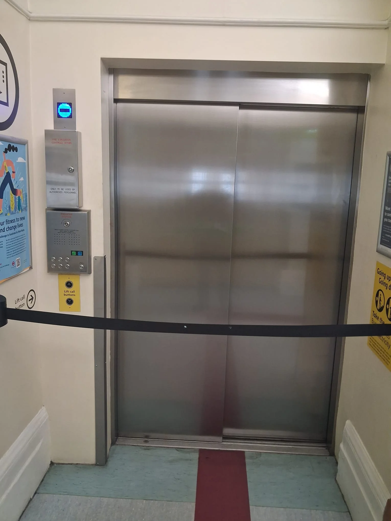 Lift entrance and call controls inspected during property maintenance