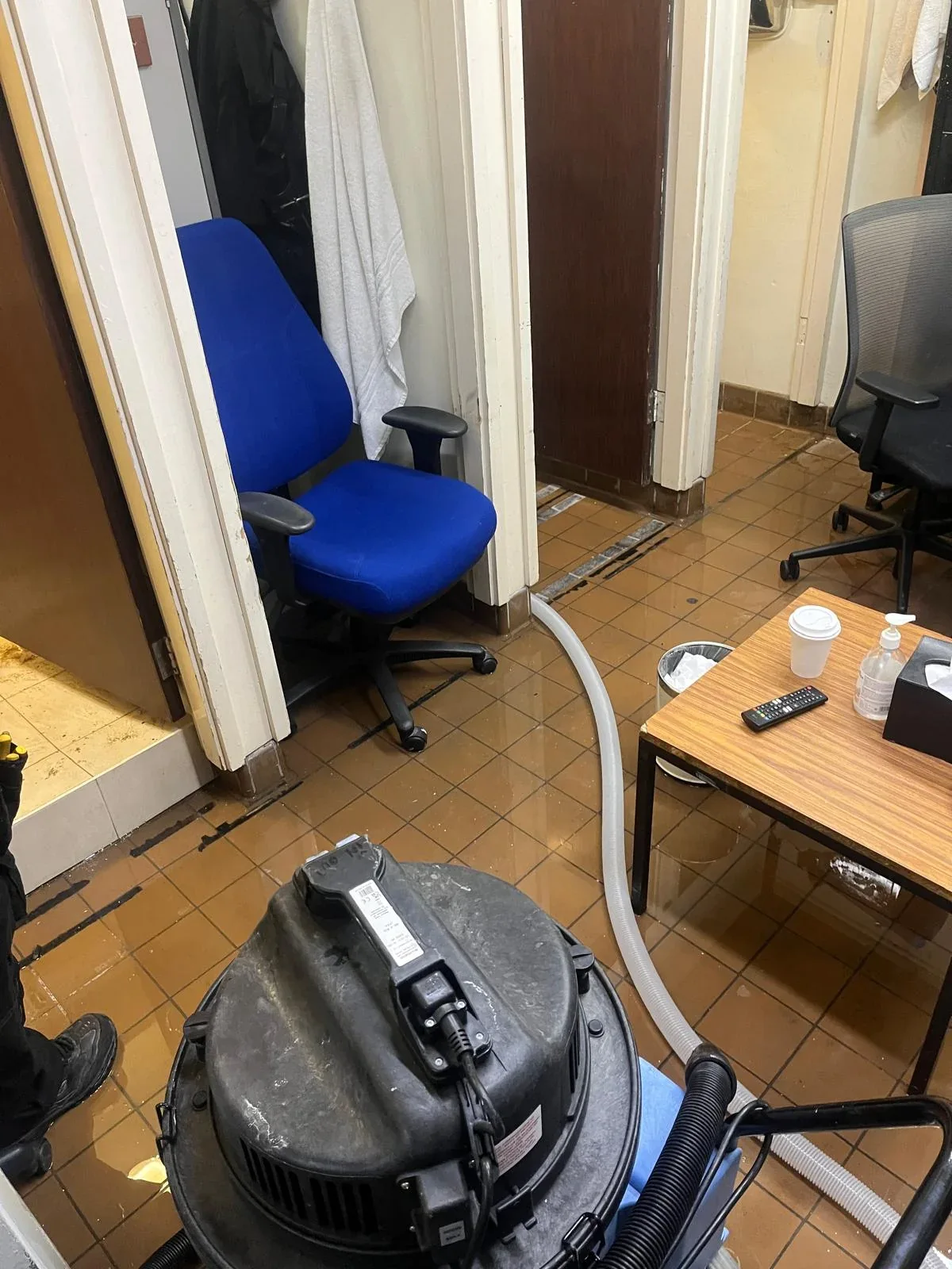 Flood water during reactive plumbing assistance