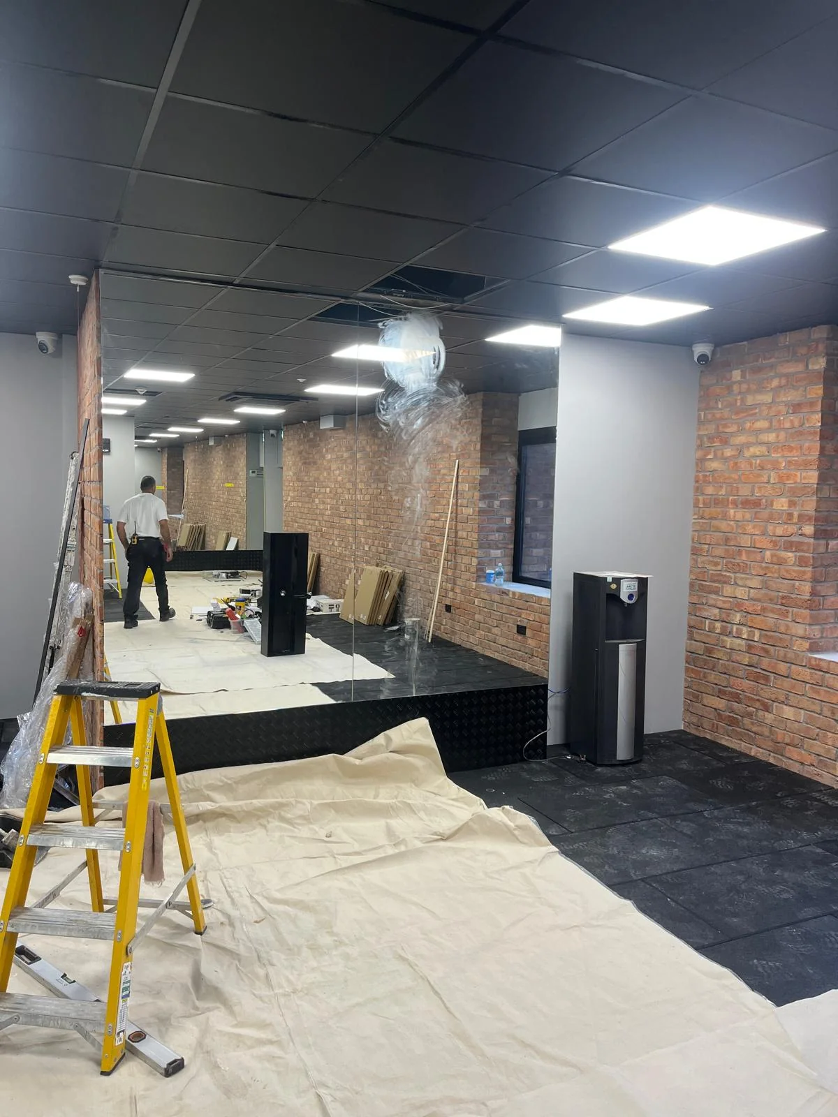 Brick-walled room during refurbishment preparation works