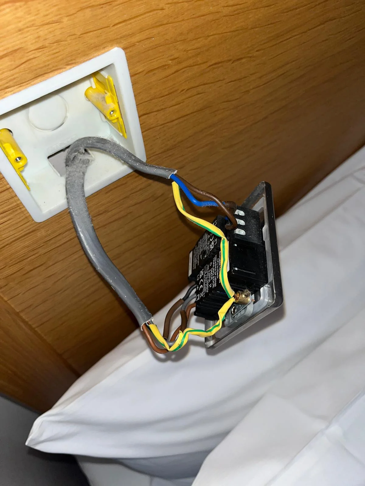 Electrical socket connections exposed during fault repair