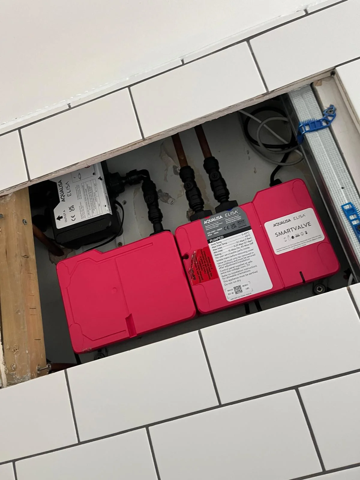 Water pressure pump installed with connected pipework