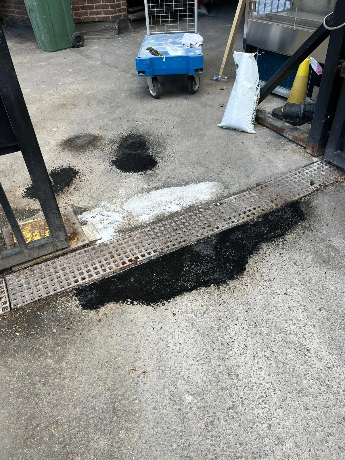 Close-up of damaged surface prepared for pothole repair