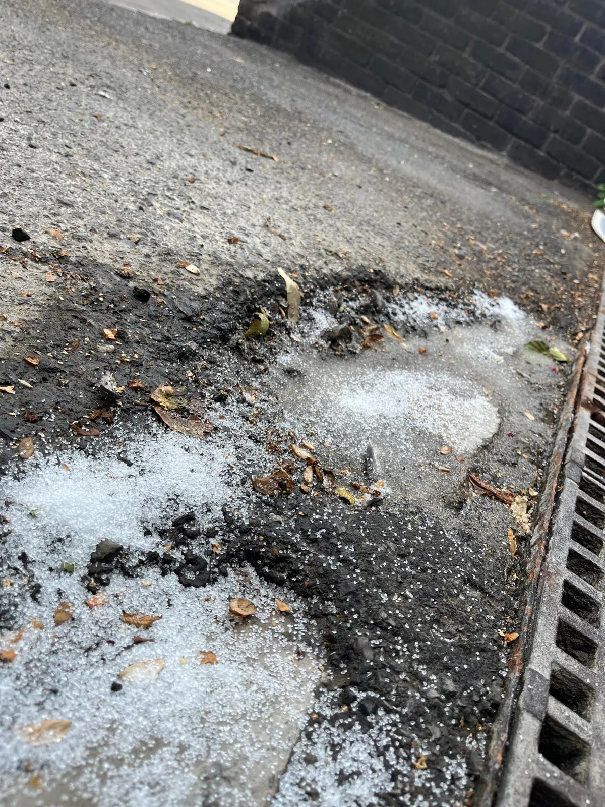 Multiple potholes undergoing tarmac repair near Sidcup